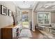 Inviting foyer with hardwood floors, stylish decor, and abundant natural light at 741 Garrett Green Way # 64, Fort Mill, SC 29715