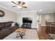 Upstairs loft area with hardwood floors and an entertainment area for cozy movie nights at 741 Garrett Green Way # 64, Fort Mill, SC 29715