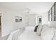 Bright bedroom featuring hardwood floors, a ceiling fan and lots of natural light at 811 Ashmeade Rd, Charlotte, NC 28211