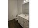 Neutral toned powder room featuring modern vanity and fixtures at 8231 Annsborough Nw Dr, Concord, NC 28027