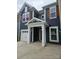 New construction home with blue siding, white trim, covered entrance and a one car garage at 8231 Annsborough Nw Dr, Concord, NC 28027
