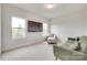 Comfortable bedroom with two windows, a couch, and an accent chair at 972 Von Buren Blvd # 242, Rock Hill, SC 29730