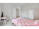 Bright bedroom with open closet doors, a vanity, and a view to the hallway at 972 Von Buren Blvd # 242, Rock Hill, SC 29730