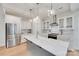 Modern kitchen featuring marble countertops, stainless steel appliances, and stylish pendant lighting at 972 Von Buren Blvd # 242, Rock Hill, SC 29730