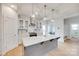 Bright, open kitchen features a large center island, modern appliances, and stylish pendant lighting at 972 Von Buren Blvd # 242, Rock Hill, SC 29730