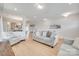 Comfortable living area with wood floors, neutral walls, and seamless flow into the open-concept kitchen at 972 Von Buren Blvd # 242, Rock Hill, SC 29730