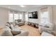 Spacious living room with cozy seating arrangements, natural light, and stylish design elements at 972 Von Buren Blvd # 242, Rock Hill, SC 29730