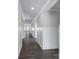 Bright hallway features hardwood floors, white trim, and recessed lighting at 10180 Lakeshore Dr, Lancaster, SC 29720