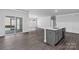 Open floor plan featuring hard surface floors, stainless appliances, and white countertops at 10180 Lakeshore Dr, Lancaster, SC 29720