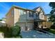 Charming two-story home featuring a two-car garage and welcoming front porch with stone accents at 107 Ameena Chase Trl, Mooresville, NC 28117
