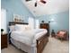Bedroom featuring a ceiling fan, a comfortable bed, and natural light at 11911 Brownestone View Dr, Charlotte, NC 28269