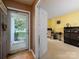 Warm entryway leading to a bright, inviting home office space at 11911 Brownestone View Dr, Charlotte, NC 28269