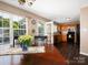 Eat-in kitchen featuring stainless steel appliances, wood cabinets, and an adjacent dining area at 11911 Brownestone View Dr, Charlotte, NC 28269