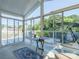 Bright sunroom with many windows provides great natural light and views of the backyard at 11911 Brownestone View Dr, Charlotte, NC 28269