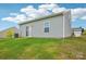 Grassy backyard with clean siding, perfect for outdoor enjoyment and entertaining at 120 Parson Ln, Statesville, NC 28625