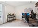 Comfortable bedroom featuring home office setup, carpeting, and a bright window at 120 Parson Ln, Statesville, NC 28625