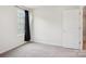 Bright, airy bedroom with a neutral palette, window, and white door at 120 Parson Ln, Statesville, NC 28625