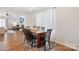 Cozy dining area with a wooden table, chairs, and a view of the living area at 120 Parson Ln, Statesville, NC 28625