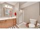 Bathroom with a walk-in shower, vanity, and toilet at 125 Highland Forest Dr, Clover, SC 29710