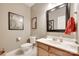 Cozy half bathroom featuring neutral tones, framed art, and a toilet at 125 Highland Forest Dr, Clover, SC 29710