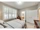 Bedroom features neutral carpet, grey walls, and view to bathroom at 125 Highland Forest Dr, Clover, SC 29710