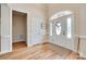 Bright entryway featuring hardwood floors, a decorative door, and high ceilings at 125 Highland Forest Dr, Clover, SC 29710