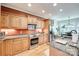 Well-equipped kitchen featuring granite countertops, a gas range, and stainless steel appliances at 125 Highland Forest Dr, Clover, SC 29710