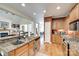 Functional kitchen with stainless appliances and granite counters, adjacent to a dining area at 125 Highland Forest Dr, Clover, SC 29710