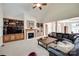 Comfortable living room featuring a fireplace, built-in bookshelves, and ample seating at 125 Highland Forest Dr, Clover, SC 29710