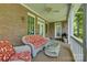 Covered porch with seating and a view of the yard at 125 Highland Forest Dr, Clover, SC 29710