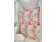 Floral shower curtain inside the bathroom with a window on the side at 125 Highland Forest Dr, Clover, SC 29710