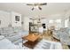 Open concept living room showcases kitchen and dining area, perfect for entertaining at 139 Suggs Mill Dr, Mooresville, NC 28115