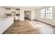 Open concept living area featuring an eat in kitchen and ample natural light, perfect for entertaining at 140 Astor St, Troutman, NC 28166