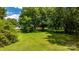 Spacious backyard with mature trees and lush green grass at 1520 21St Ne Ave, Hickory, NC 28601