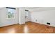 Bright bedroom with hardwood floors and two windows that provide natural light, creating a welcoming and cozy ambiance at 1520 21St Ne Ave, Hickory, NC 28601