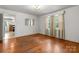 Dining room with hardwood floors, white walls, and natural light, offering a bright space for Gathering meals at 1520 21St Ne Ave, Hickory, NC 28601