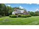 Well-maintained brick home with a manicured lawn and mature landscaping at 1520 21St Ne Ave, Hickory, NC 28601