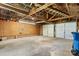 Open garage with concrete floor, pegboard walls, and two white garage doors at 1520 21St Ne Ave, Hickory, NC 28601