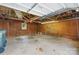 Spacious garage with exposed ceiling and concrete floors, offering ample storage at 1520 21St Ne Ave, Hickory, NC 28601