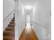Inviting hallway featuring hardwood floors that leads to the bedrooms and other living areas at 1520 21St Ne Ave, Hickory, NC 28601
