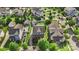 Aerial view showing the house's lot with mature trees, and the surrounding neighborhood at 17327 Summers Walk Blvd, Davidson, NC 28036