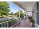 Spacious front porch with beautiful railing and view of street and front yard at 17327 Summers Walk Blvd, Davidson, NC 28036