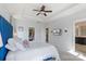 Comfortable main bedroom with tray ceiling, carpet and access to main bathroom at 17327 Summers Walk Blvd, Davidson, NC 28036