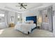 Spacious main bedroom with tray ceiling, plush carpet, and ample natural light at 17327 Summers Walk Blvd, Davidson, NC 28036