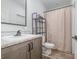 Clean bathroom with stylish vanity, modern fixtures, and a shower curtain at 1870 Hwy 49 None, New London, NC 28127