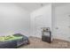 Bright bedroom boasts neutral carpet and trim, and a unique fish tank at 1870 Hwy 49 None, New London, NC 28127