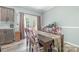 Charming dining area with table and chairs with backyard access, perfect for entertaining at 1870 Hwy 49 None, New London, NC 28127