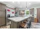 Well-equipped kitchen featuring an island with seating, stainless steel appliances and ample storage at 1870 Hwy 49 None, New London, NC 28127