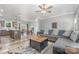 Open-concept living space features a kitchen island, dining area, and comfortable seating at 1870 Hwy 49 None, New London, NC 28127