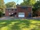 An external view of a house's back with an attached garage at 209 8Th Nw Ave, Hickory, NC 28601